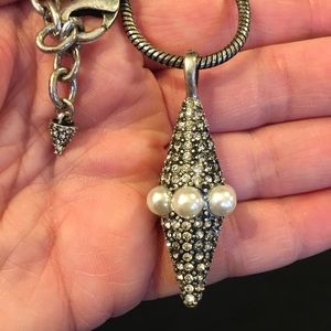 Necklace with sparkly pendant